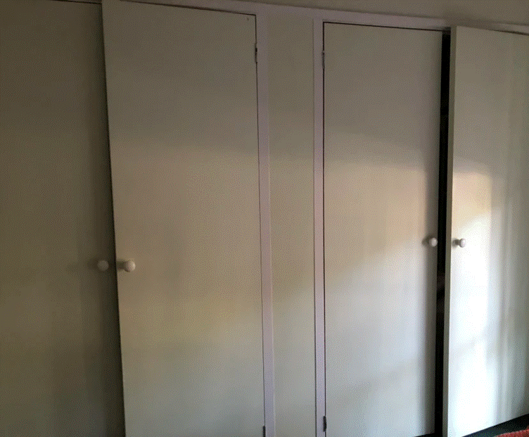 A picture containing wall, indoor, wardrobe, shower

Description automatically generated