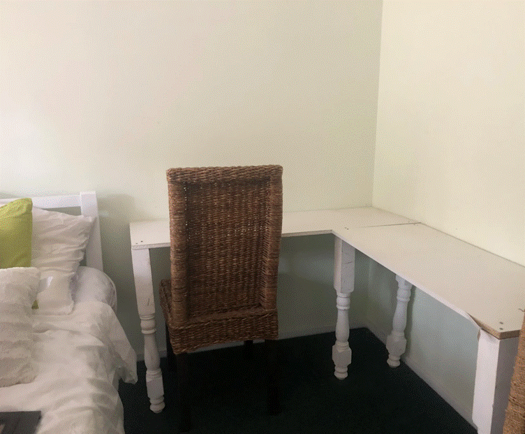 A chair in a room

Description automatically generated with medium confidence